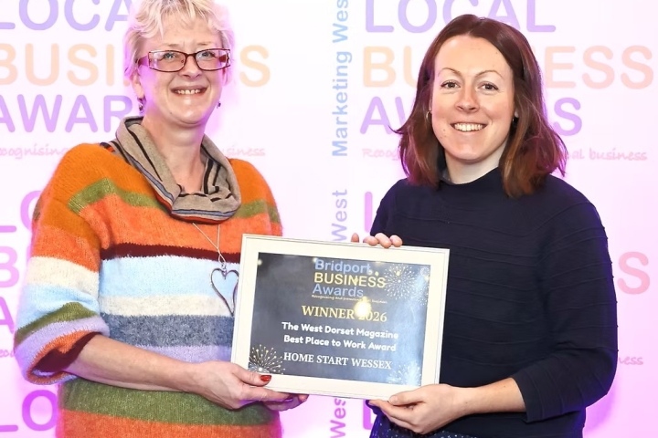 Debbie-Phillips-White-of-Home-Start-Wessex-accepting-the-Bridport-Best-Place-to-Work-Award.jpeg