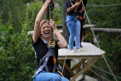 Woman-laughing-on-the-zipwire-at-Hangloose-Adventure.jpg